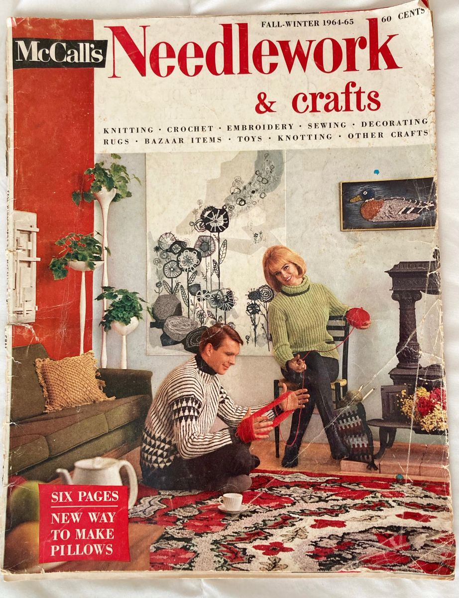A photograph of a McCall's Needlework magazine dated Winter 1964-1965